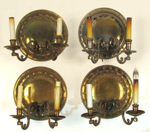 4 ANTIQUE CONTINENTAL ROUND BRASS SCONCES: 3 matching 1 odd. Rewiring recommended. Good condition. 11"diam.