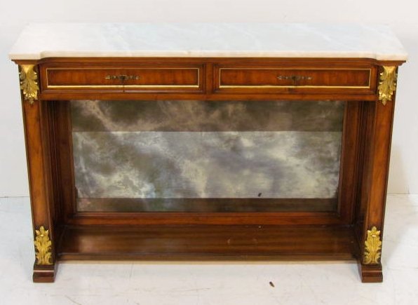 MARBLETOP CONSOLE TABLE: Walnut finish with gilt carvings. Caned sides. 29 1/2"h. x 44"w. x 12"d.