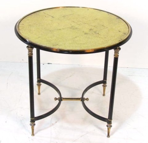 DIRECTOIRE STYLE EBONIZED METAL & BRASS TABLE: Gilt glass top. Very good condition. 22"h. x 24 1/2"w.