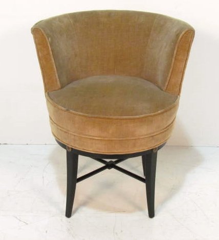 EBONIZED UPHOLSTERED VANITY STOOL: Bronze rosettes. Lightly soiled upholstery. Swivel seat. Very good condition. 28"h. x 24 1/2"w. x 21 1/2"d.
