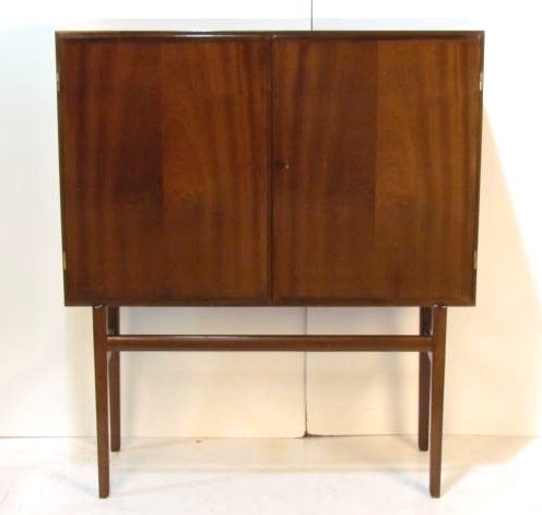 OLE WANSCHER DANISH MAHOGANY CHINA CABINET: Light scratch on doors. Very good condition. 55 1/4"h. x 47 1/4"w. x 16"d.