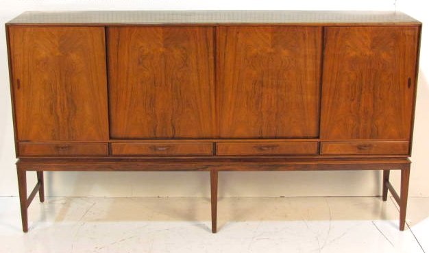OLE WANSCHER ROSEWOOD SIDEBOARD: Some veneer chips. Very good condition. 46"h. x 83 1/2"w. x 16 3/4"d.