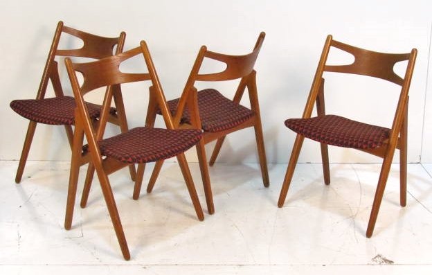 4 HANS WEGNER OAK SAWBUCK CHAIRS: For Carl Hanson and Son. Very good condition. 32"h. x 20"w. x 19"d.