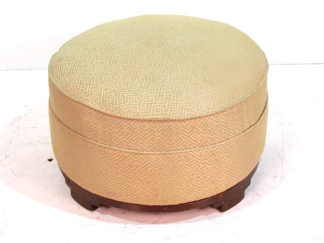 JAMES MONT STYLE MID CENTURY ROUND OTTOMAN: Good condition with wear to finish. 13 1/2"h. x 23 1/2"diam.