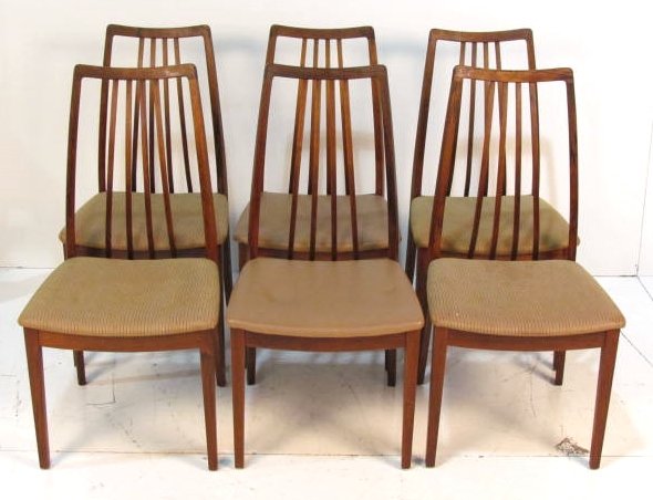 6 ARNE VODDER ROSEWOOD DINING CHAIRS: Light wear to finish. Good condition. 37 3/4"h. x 19 1/2"w. x 21"d.