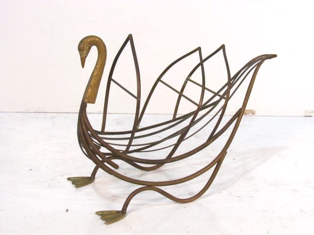 JANSEN STYLE BRASS MAGAZINE RACK: Very good condition. 17 1/2"h. x 24"w. x 10"d.