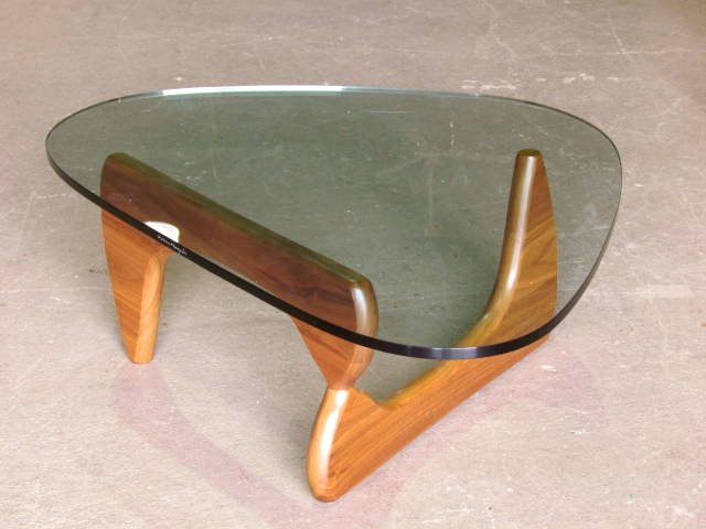ISAMU NOGUCHI for HERMAN MILLER COFFEE TABLE: Signed Isamu Noguchi on glass and base. Very good condition. 15 3/4"h. x 50"w. x 36"d.