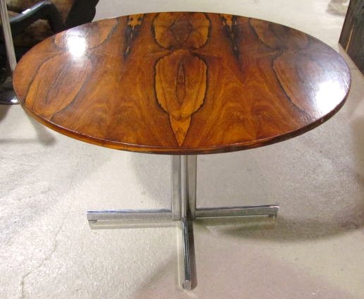 STENDIG SCANDINAVIAN ROSEWOOD ROUND PEDESTAL TABLE: Very good condition. 28 1/2"h. x 48" diameter.