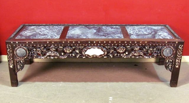 CHINESE INLAID MARBLETOP TEAK COFFEE TABLE: Later mouldings applied to top. Cracked marble tops. 21 1/2"h. x 71 3/4"w. x 24 1/2"d.