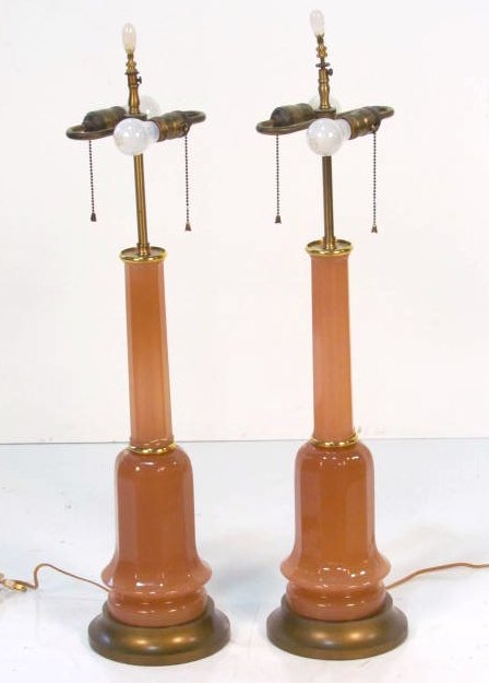 Pair PINK SALMON OPALINE GLASS COLUMN LAMPS: Gilt wood bases. Very good condition. 34"h. 19 3/4"h. to glass. Rewiring recommended or may be required on all lighting.