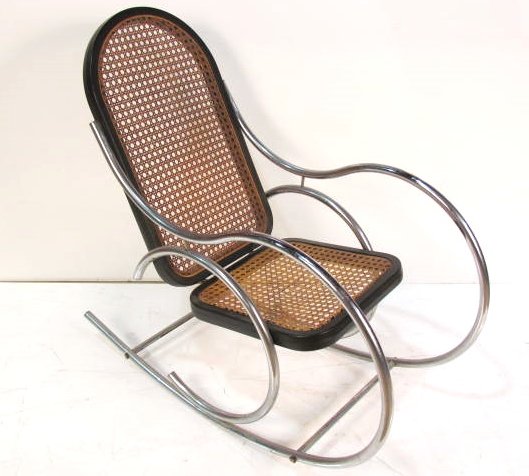 THONET STYLE BENT CHROME & CANED ROCKING CHAIR: Some wear to caning. Good condition. 40 1/2"h. x 20"w. x 43"d.