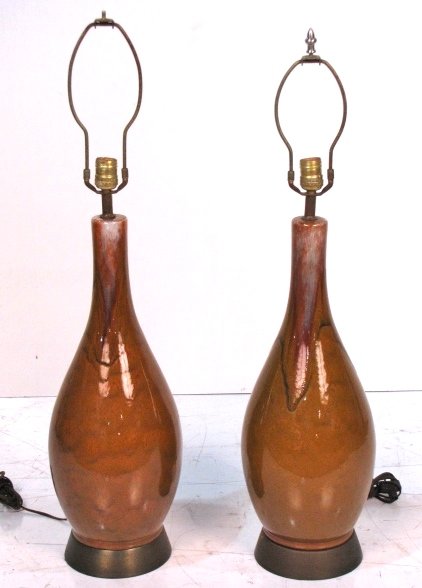 Pair MODERN CERAMIC TABLE LAMPS: Good condition. Pitted metal bases and fixtures. 22 1/4" high to base of fixture. Rewiring recommended or may be required on all lighting.