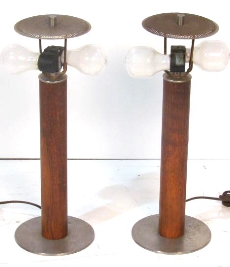Pair MID CENTURY CHROME & TEAK TABLE LAMPS: Good condition. Pitting to metal. No shades. 17 3/4" high. Rewiring recommended or may be required on all lighting.