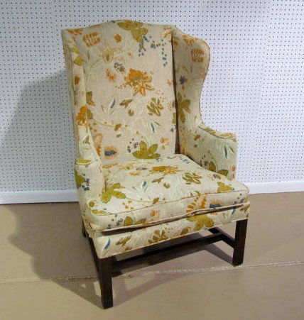 C.W. KITTINGER FLORAL UPHOLSTERED MAHOGANY WING CHAIR: Very good condition. 46 1/4"h. x 32"w. x 29"d.