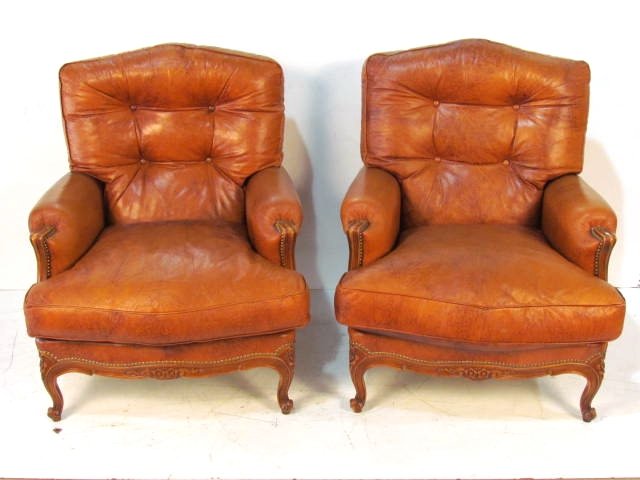 Pair FRENCH CARVED LEATHER BERGERES: Very good condition. 35"h. x 31"w. x 37"d.