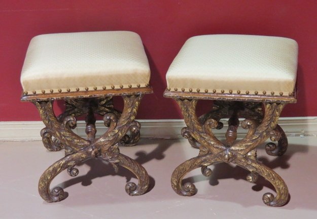 Pair ANTIQUE ENGLISH REGENCY X-BENCH FOOTSTOOLS: Distress paint and gilt. Recently upholstered. 20"h. x 17"sq.