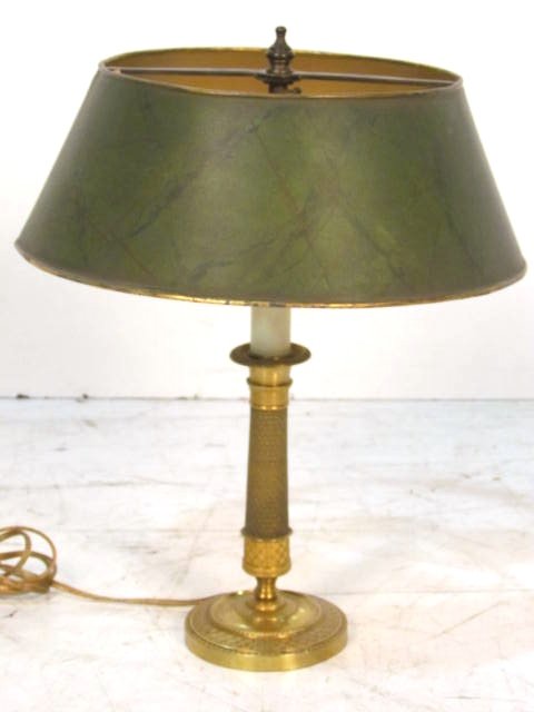 BRASS BOUILLOTTE LAMP w/ TOLE METAL SHADE: Faux painted tole metal shade. Fine quality brass base. Very good condition.Rewiring recommended or may be required on all lighting. 16"h.
