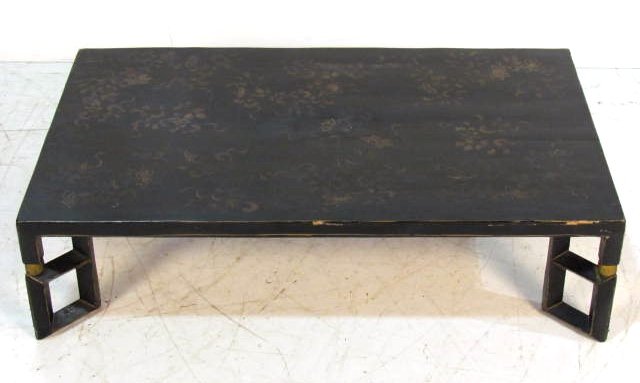CHINESE PAINT DECORATED BLACK LACQUER COFFEE TABLE: Wear to finish. Good condition. 10 1/4"h. x 39"w. x 23 1/4"d.