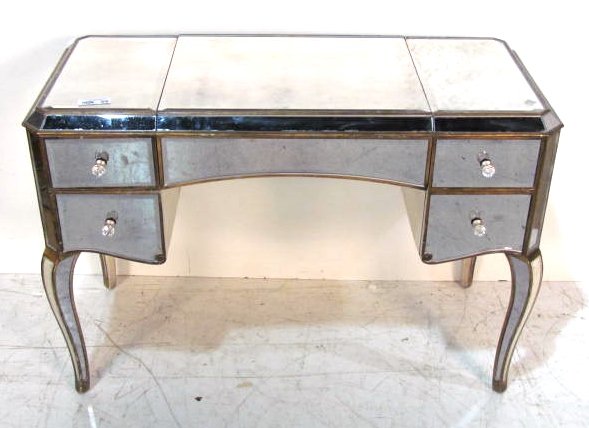 VINTAGE DISTRESS MIRRORED DRESSING TABLE: Beveled mirror panels. Gilt wood trim. Very good condition. 30 1/4"h. x 43 3/4"w. x 20"d.