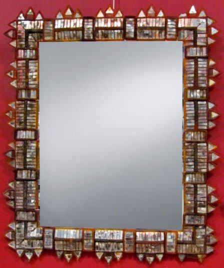 MID CENTURY RESIN & MIRROR HANGING MIRROR: Aquired from the Bunny Williams apartment. Repairs. 52"h. x 44"w.