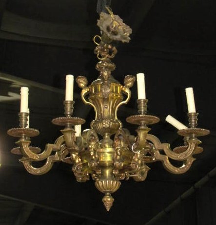 FRENCH FIGURAL BRONZE CHANDELIER w/ PUTTIS: Putti and maiden busts. Very good condition. Rewiring recommended or may be required on all lighting.28"h. x 32"diam.