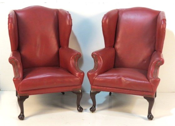 Pair CUSTOM ENGLISH RED LEATHER WING CHAIRS: Very good condition. 47"h. x 34"w. x 35"d.