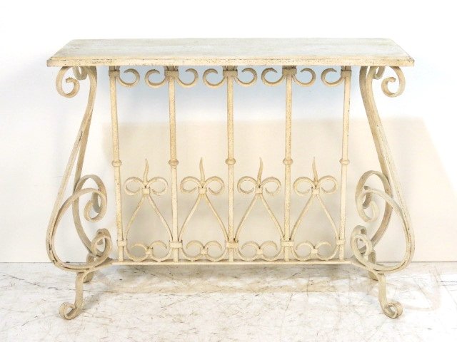 WROUGHT IRON CONSOLE w/ TRAVERTINE MARBLETOP: Paint chipping and flaking. Rusting. Good condition. 37"h. x 45 1/4"w. x 16"d.