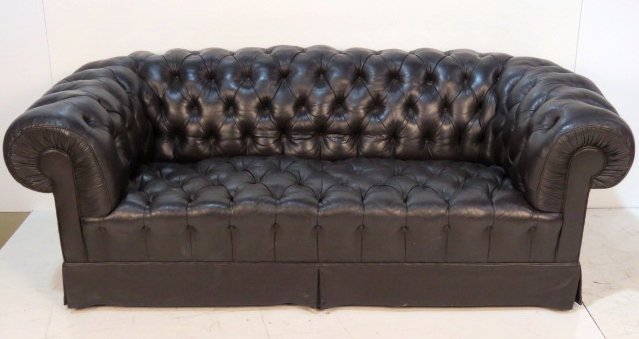 BLACK TUFTED LEATHER CHESTERFIELD SOFA: Some minor scuffs. Good condition. 34"h. x 88"w. x 44"d.