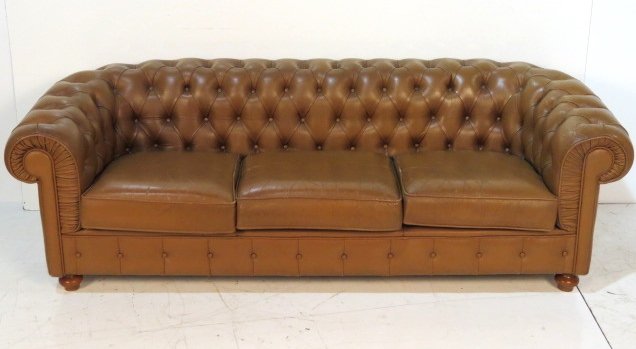 TUFTED DISTRESSED BROWN LEATHER CHESTERFIELD SOFA: Distressed leather with wear. Good condition. 27"h. x 84"w. x 34"d.