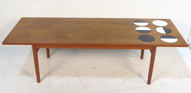 GRETE JALK POUL JEPPESEN DANISH MODERN COFFEE TABLE: Teak with inset laminate circles. Light wear to top. Good condition. 18 1/4"h. x 63"w. x 23 5/8"d.