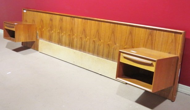 DANISH MODERN TEAK KING SIZE BED FRAME: Attached nightstands. Very good condition. Headboard measures 27 1/2"h. x 121"w. x 16"d.