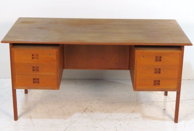 ARNE VODDER DANISH TEAK DESK: Light wear to top. Good condition. 28 1/4"h. x 66 3/4"w. x 29 1/4"d.