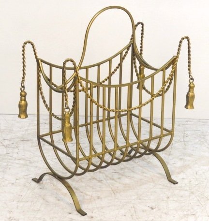 ITALIAN MID CENTURY IRON ROPE & TASSEL MAGAZINE RACK: Good condition with some paint wear. Good condition. 28 1/2"h. x 24"w. x 12"d.