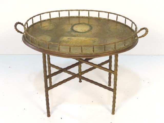 ORIENTAL BRASS BAMBOO FORM TRAY TABLE: Wear to brass finish. Good condition. 19 3/4"h. x 28 1/4"w. x 17"d.