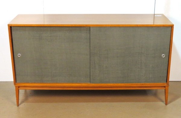PAUL McCOBB FOR WINCHESTER SLIDING DOOR CONSOLE: Green burlap doors. Very good condition. 33 1/4"h. x 60"w. x 18 1/8"d.