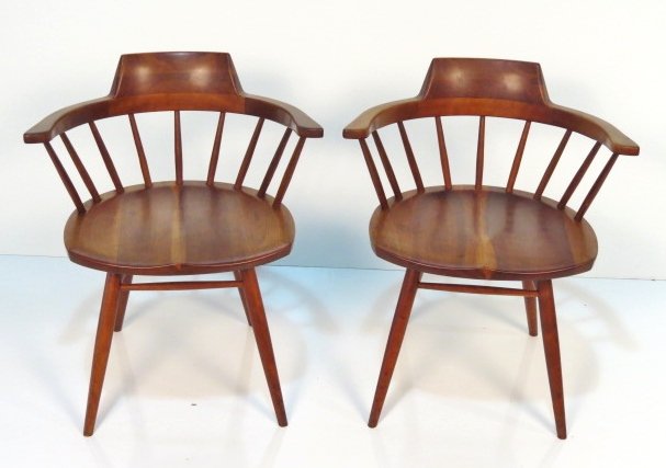Pair GEORGE NAKASHIMA CAPTAINS CHAIRS: Some light scratching. Very good condition. 28 1/4"h. x 23 1/2"w. x 20 1/2"d.