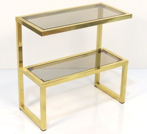 ITALIAN MODERN 2 TIER BRASS SIDE TABLE: Light wear to brass. Good condition. 24"h. x 24 1/2"w. x 12"d.