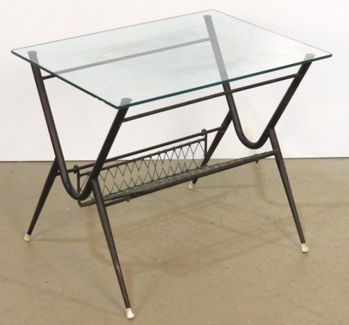 ITALIAN BLACK IRON & GLASS SIDE TABLE: Missing small pieces on webbing. Fair condition. 19 1/2"h. x 23"w. x 17 1/4"d.