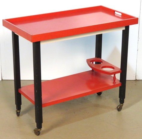 ITALIAN MODERN RED & BLACK FORMICA BAR CART: Good condition. 30"h. x 33 1/2"w. x 17 3/4"d.