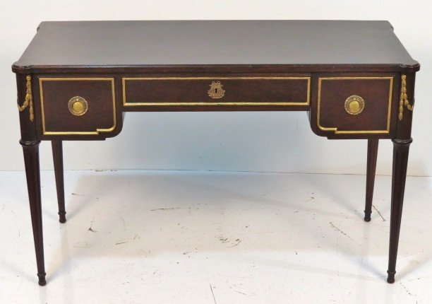 JOHN WIDDICOMB LOUIS XVI STYLE MAHOGANY DESK: Mahogany and gilt. Good condition. 38 1/2"h. x 40"w. x 21"d.