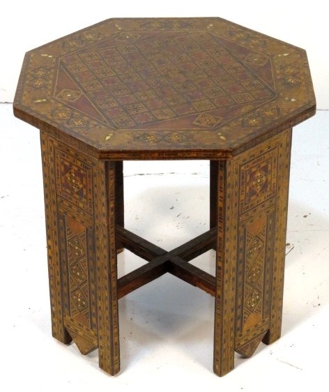 ANTIQUE MOORISH OCTAGONAL INLAID SIDE TABLE: Inlaid woods and mother of pearl. Some minor veneer damages. Good condition. 17 1/2"h. x 18"w. x 18"d.