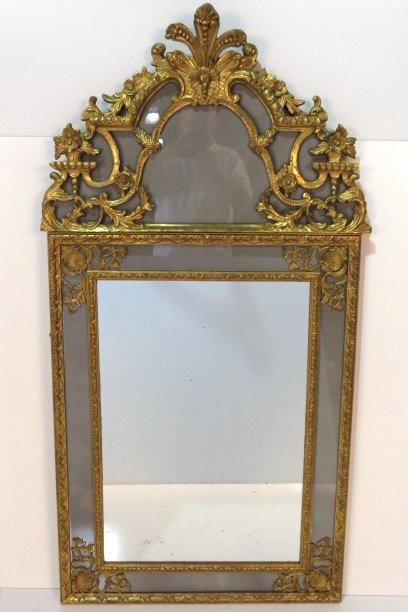 5' ANTIQUE LOUIS XVI STYLE GILT MIRROR: Carved wood. Minor gilt losses. Reverse painted gray glass panels. Damage on top. Good condition. 60"h. x 32"w.