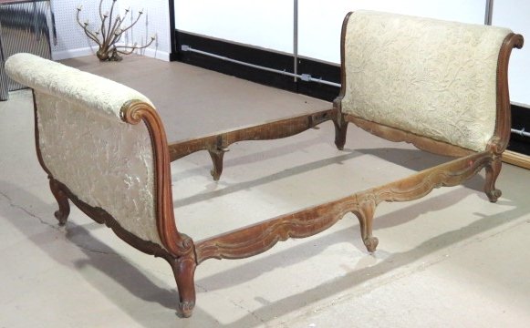ANTIQUE LOUIS XV STYLE CARVED DAYBED: Wear to finish. Broqueted with wear. Fair condition. 37"h. x 46"w. x 83"d.