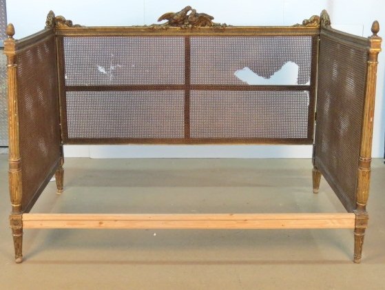 ANTIQUE FRENCH LOUIS XVI STYLE CANED DAYBED: Distressed gilt with wear and losses. Damaged cane. Replaced front rail. Fair condition. 55"h. x 81"w. x 51 1/2"d.