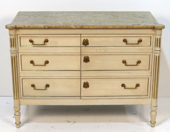 LOUIS XVI STYLE CREAM PAINTED MARBLETOP COMMODE: Distressed cream paint and gilt. Bronze mouldings. Missing interior shelf. Small chip in marble. Very good condition. 36"h. x 49"w. x 22"d.