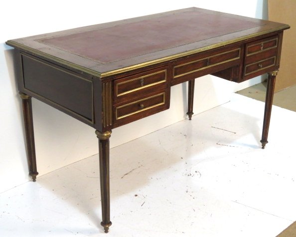 ANTIQUE LOUIS XVI STYLE LEATHERTOP BUREAUPLAT: Bronze mounts and mouldings. Good condition with overall wear. 30 1/2"h. x 51"w. x 27 3/4"d.