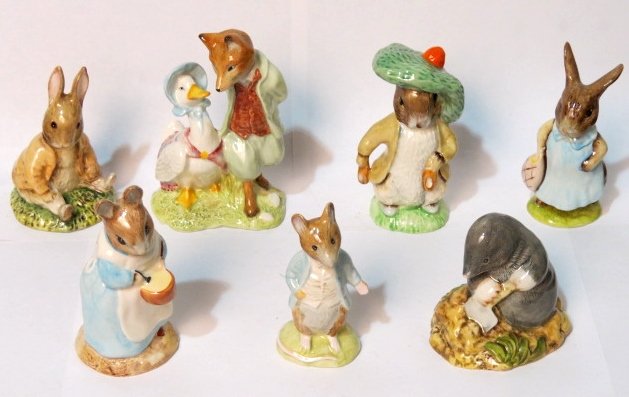 7 ROYAL ALBERT BEATRIX POTTER FIGURINES: Very good condition. 3"h. - 5 7/8"h.