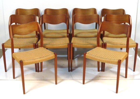 10 NIELS O. MOLLER DANISH TEAK DINING CHAIRS: Niels O. Moller. Woven grass seats. Very good condition. 32"h. x 19 1/2"w. x 18 1/2"d.