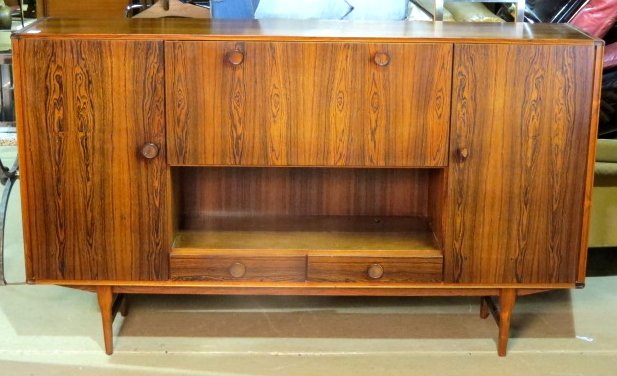FRISTHO HOLLAND MODERN ROSEWOOD CREDENZA w/ BAR: 1 broken knob. Very good condition. 47"h. x 79 1/2"w. x 17"d.