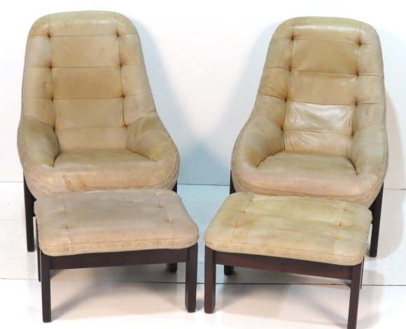 Pair SCANDINAVIAN MODERN LEATHER LOUNGE CHAIRS &: Distressed leather with stains. Good condition. Chairs measure 38"h. x 28"w. x 32"d. Ottomans measure 13"h. x 24"w. x 20 1/2"d.